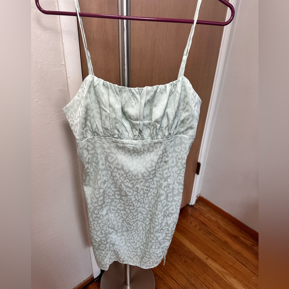 Beautiful mint color leapord print short dress in size L by Forever21